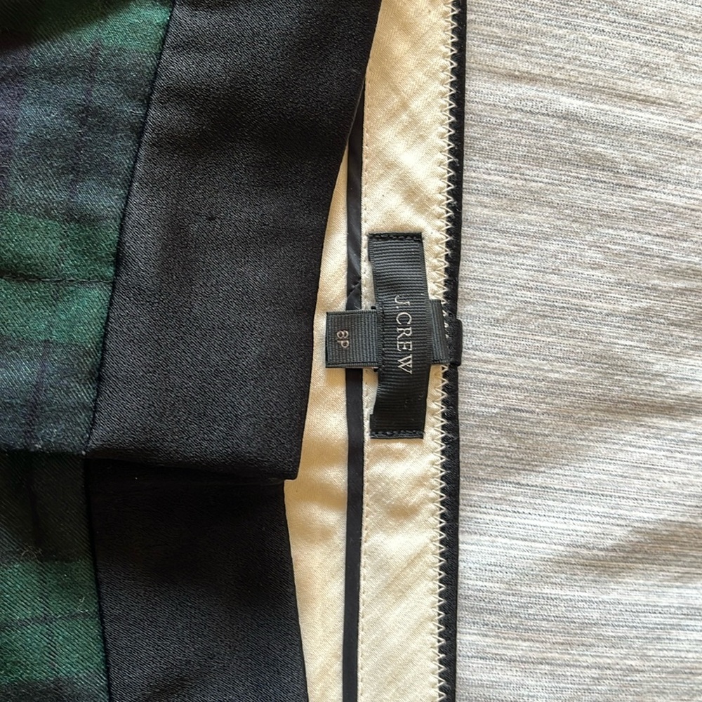 Plaid navy and green tuxedo cropped pants.